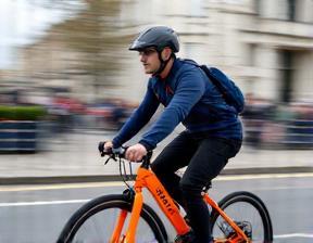 Speedy food courier on electric bike in London